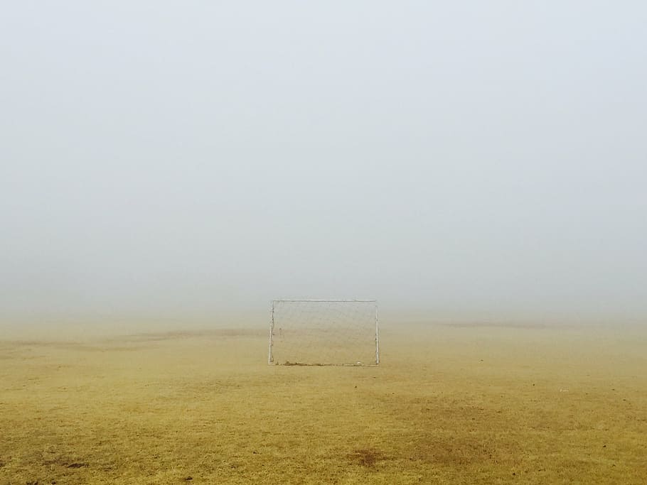 white goalie on brown soil, soccer, field, fog, dry, grass, play