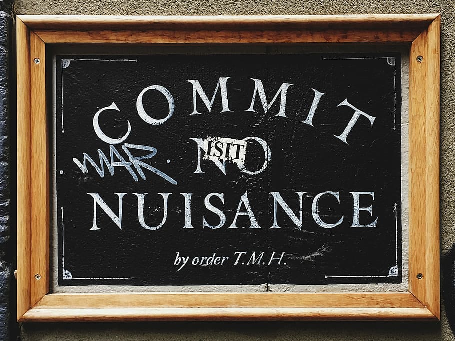 Commit No Nuisance signage with brown wooden frame, Commit no Nuisance quote placed on stone surface, HD wallpaper