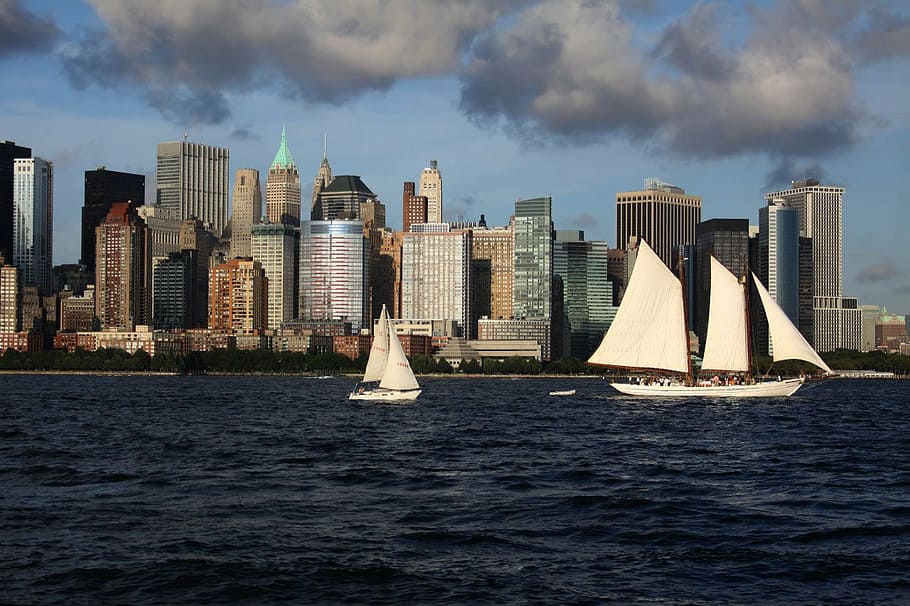 city, skyline, building, clouds, boat, sail, river, architecture HD wallpaper