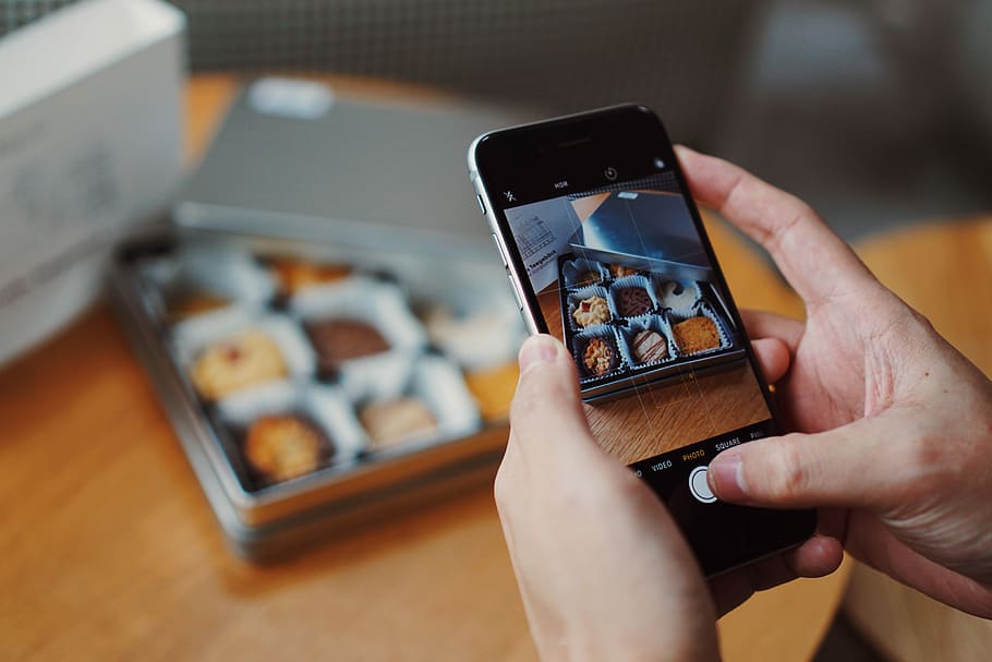 person using phone camera, space gray iPhone 6 capturing brownies HD wallpaper