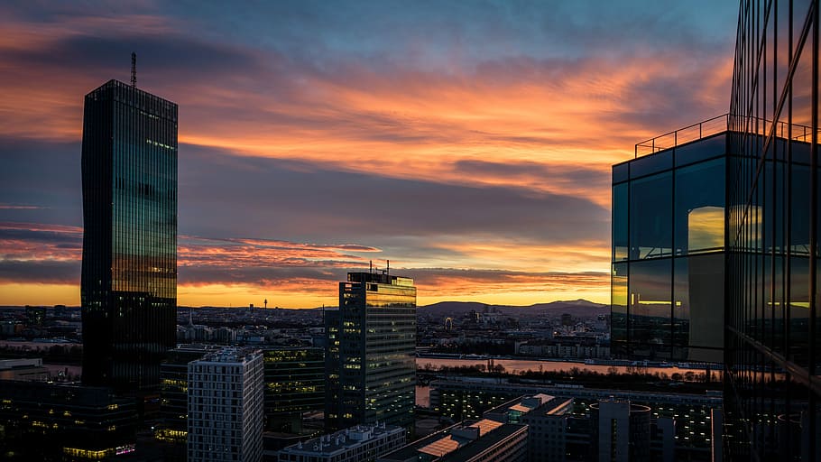 Sunset and city views with towers in Vienna, Austria, clouds HD wallpaper