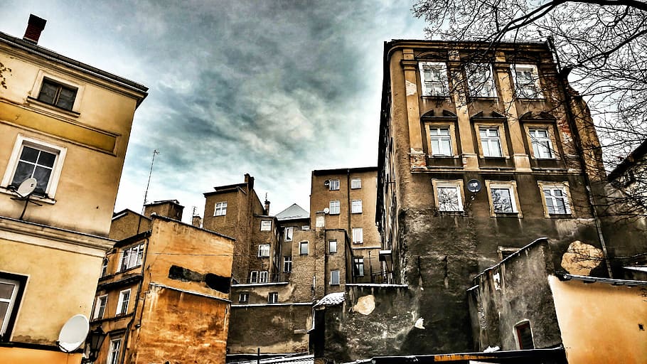 photography of brown concrete high-rise buildings, worms eye view of building HD wallpaper