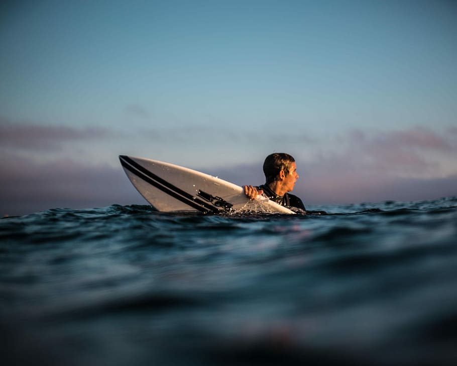 jacob, man holding surfboard on body of water, surfing, ocean HD wallpaper