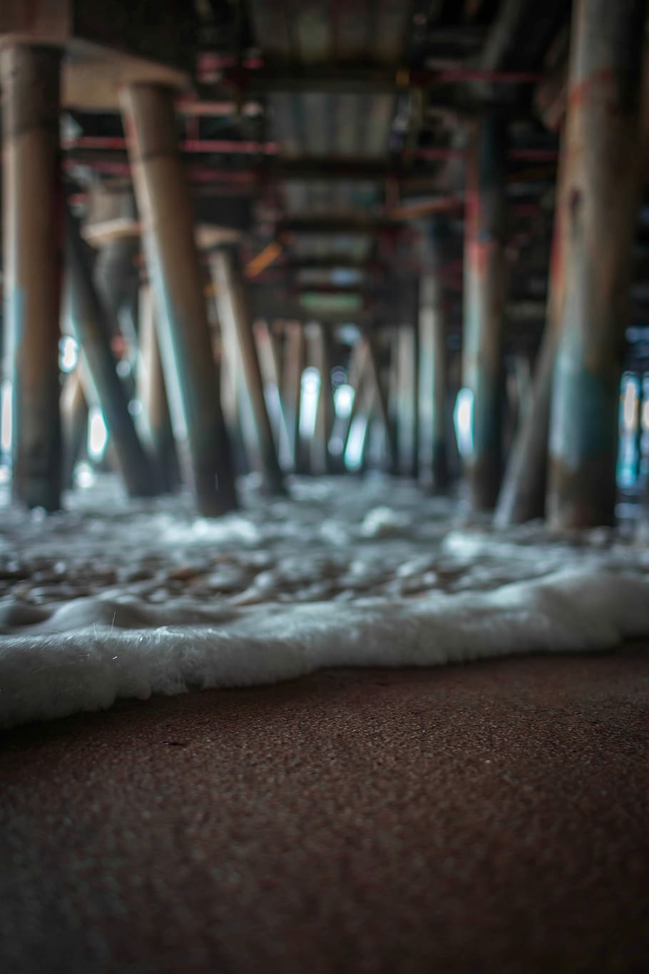 Underneath Santa Monica Pier, sea foam under wooden docks, ocean HD wallpaper