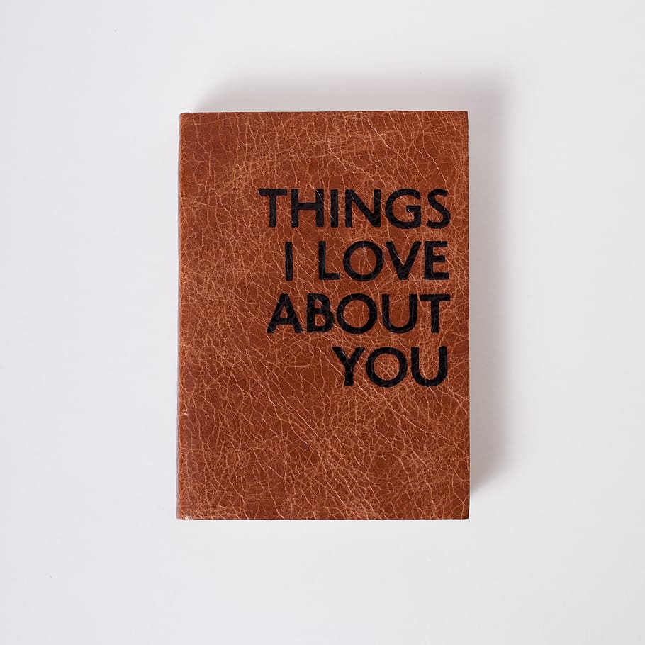 brown and black leather Thing I Love About You printed decor HD wallpaper