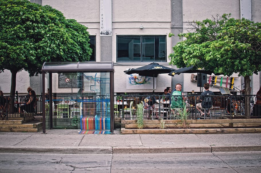 city, road, man, people, architecture, buildings, bus stop, chairs HD wallpaper