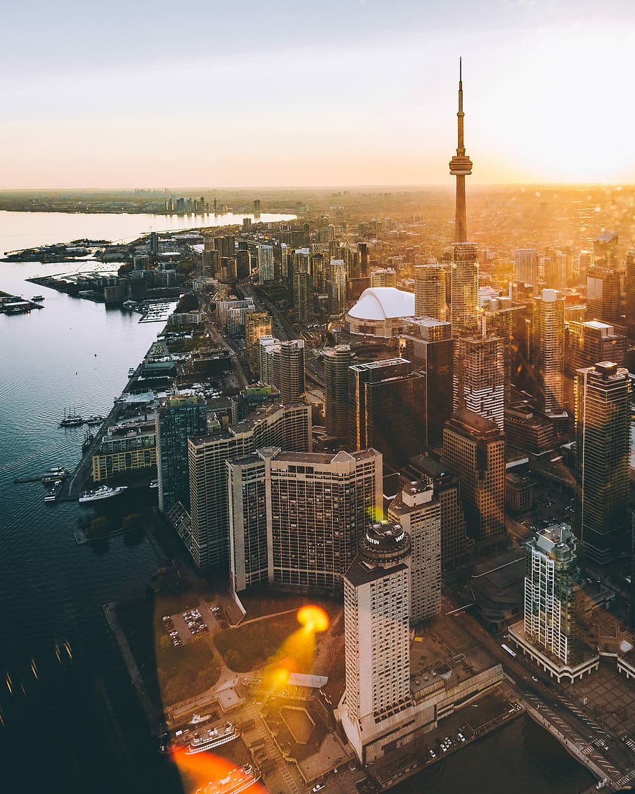 aerial photo of city during golden hour, aerial photography of CN Tower, Toronto, Canada