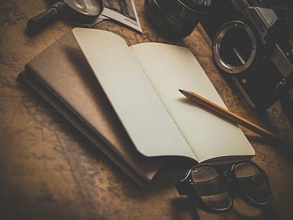 brown pencil on white book beside black eyeglasses, yellow pencil on top of notebook HD wallpaper