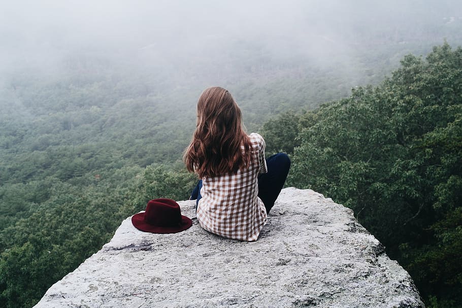 woman sitting on edge of rock cliff, facing, tree, girl, people, HD wallpaper
