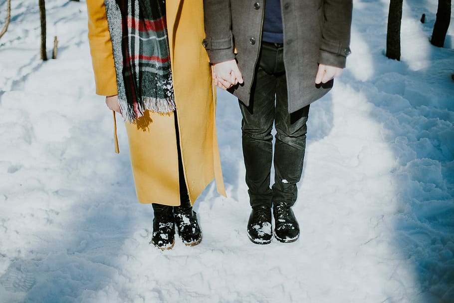 person standing beside each oter, man and woman standing on snows HD wallpaper