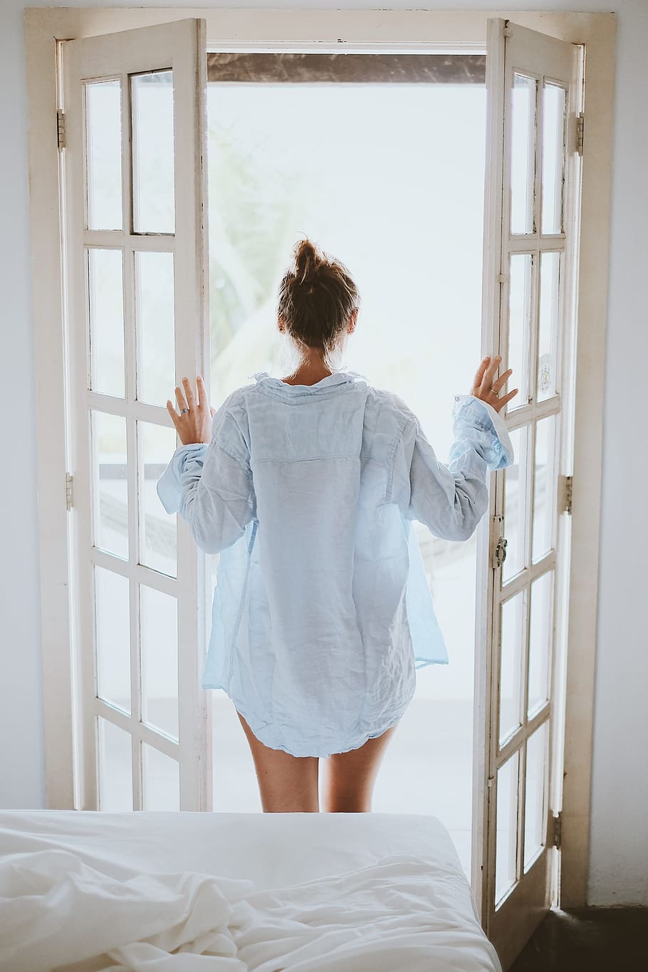 woman standing on door holding open door wearing white dress shirt, HD wallpaper