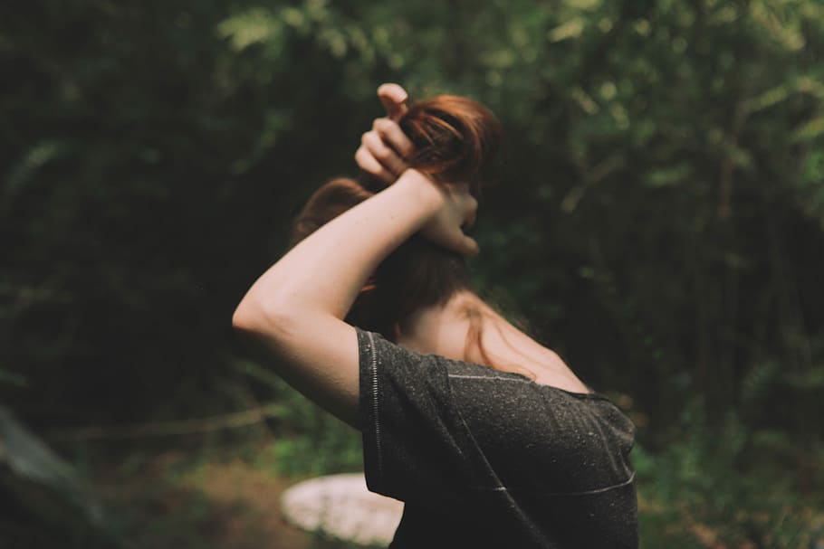 standing woman tying her hair at daytime, women, outdoors, nature HD wallpaper
