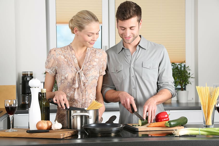 man in gray dress shirt, woman, kitchen, everyday life, blond