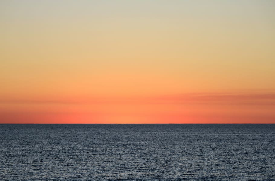landscape photography of sea, calm blue ocean during sunset, orange HD wallpaper