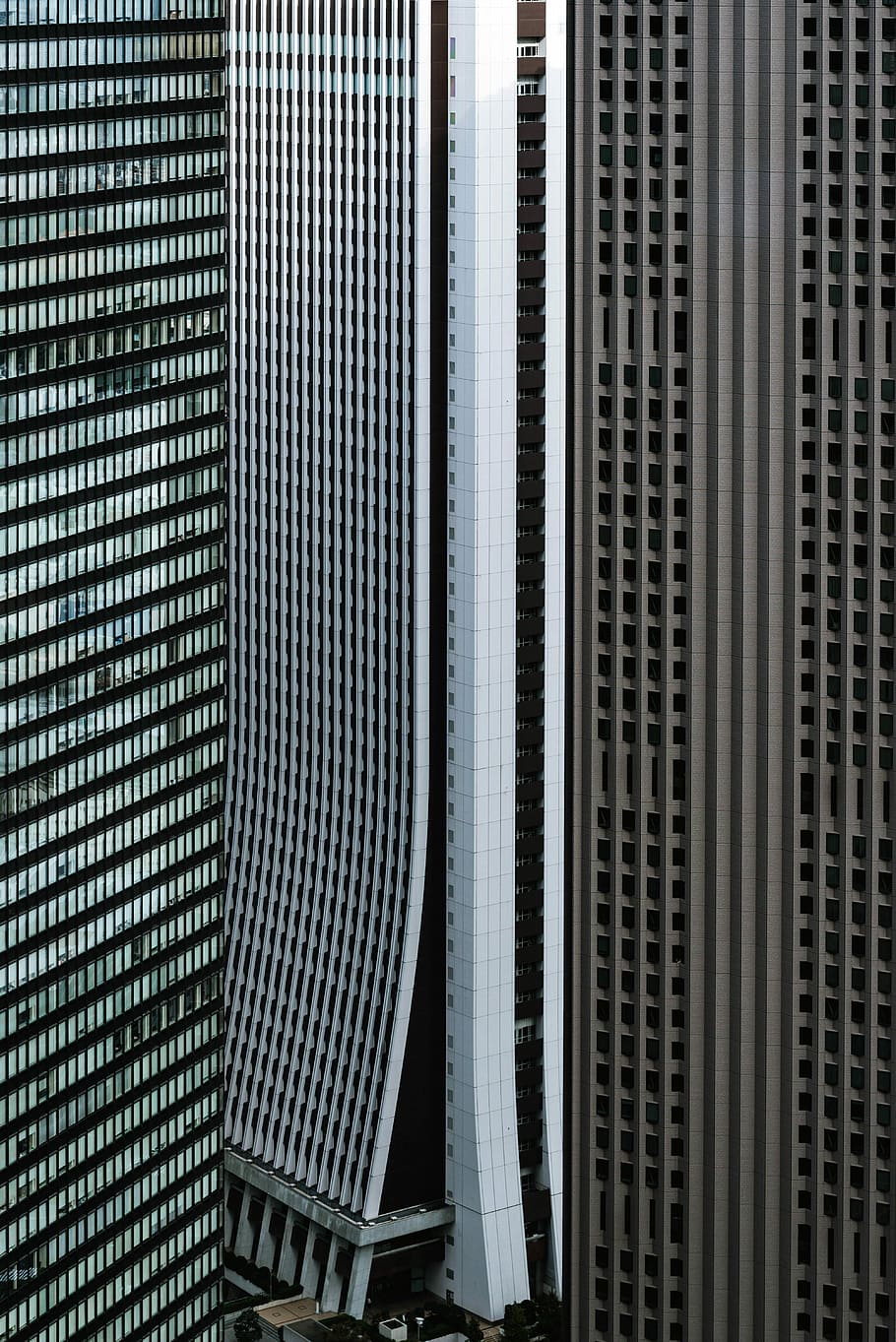 gray, white, and brown high-rise buildings, aerial photography of white and black skyscraper HD wallpaper