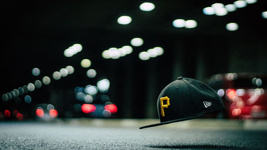 Black and Yellow P Cap Hanging in the Air, action, blur, bokeh HD wallpaper