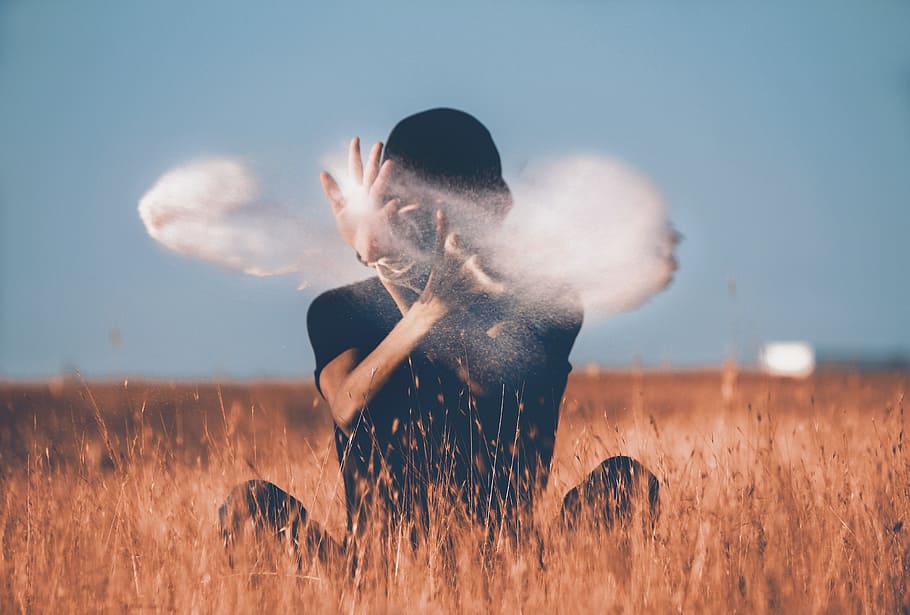 man sitting on brown grass field playing with smoke, Splash, person HD wallpaper