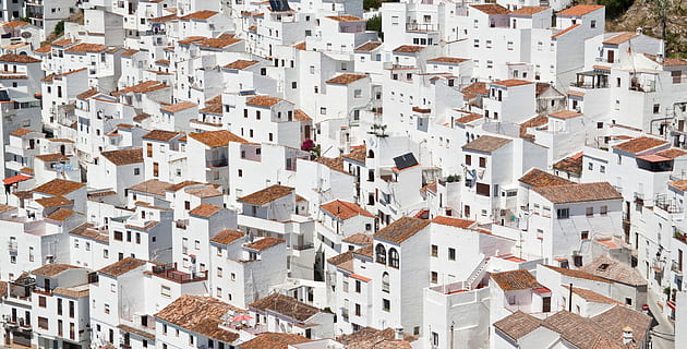 aerial photo of white and brown concrete buildings at daytime HD wallpaper