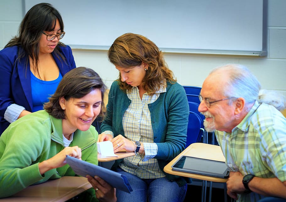 group of people sitting on chairs near dry erase board, faculty HD wallpaper