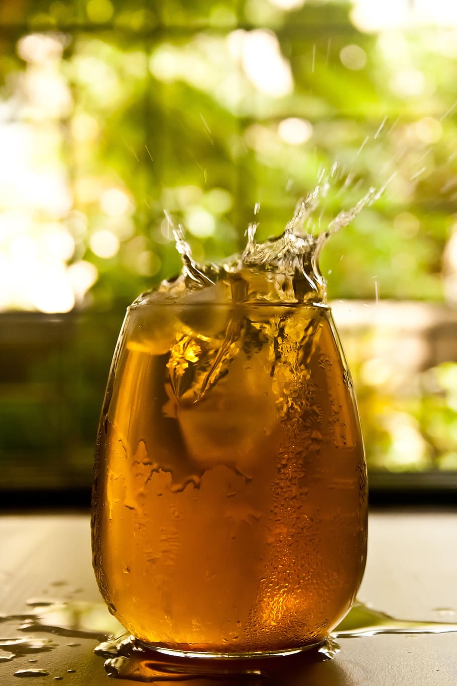 clear drinking glass with orange liquid, beverage, splash, ice cube, HD wallpaper