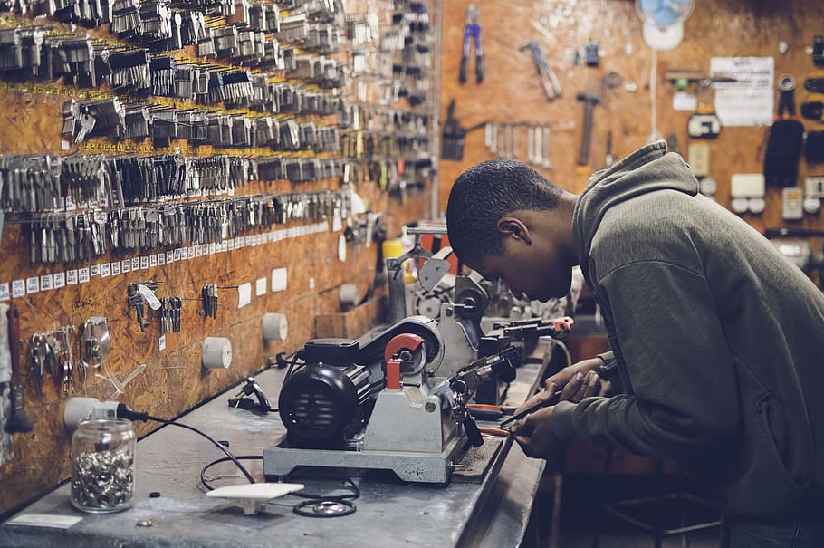 guy, man, people, working, keys, equipment, workshop, tools HD wallpaper