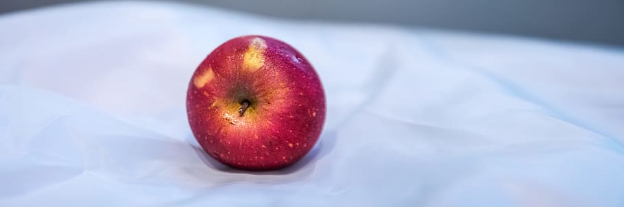 Red Apple Fruit on White Textile, food, raw, food and drink, healthy eating HD wallpaper