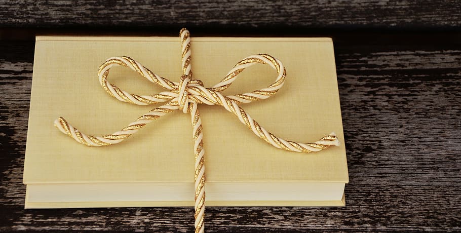 yellow book with tie, gift, cord, gold cord, golden, packaging, HD wallpaper