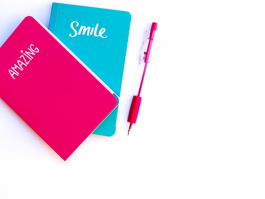 two teal and pink books with pink click pen, blue, notebook HD wallpaper