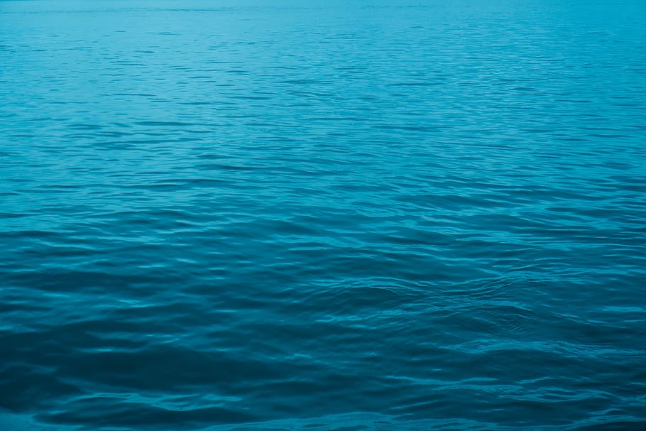 photo of still body of water, blue, ocean, sea, current, nature