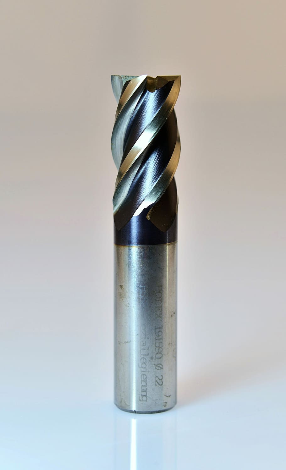 gray drill bit on white panel, milling cutters, end mill, machining