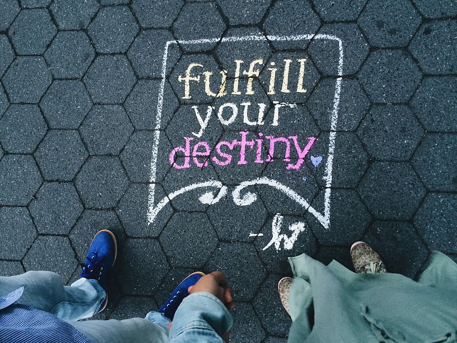 two person standing on full your destiny pavement artwork, two persons standing on concrete floor