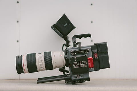 green and white professional camera, photo of black and white professional video camera beside white wall HD wallpaper