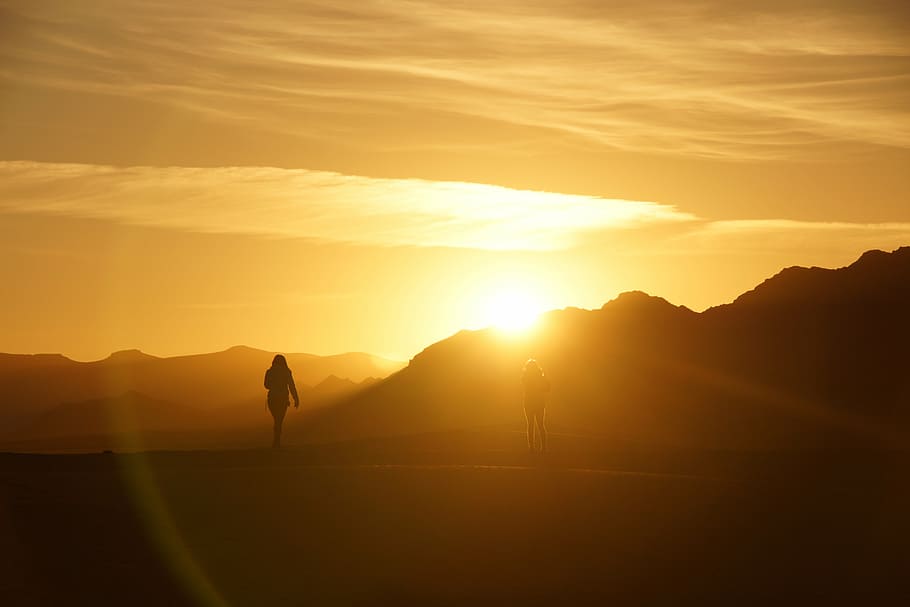 silhouette photo of two person near mountains, sunrise, morocco HD wallpaper