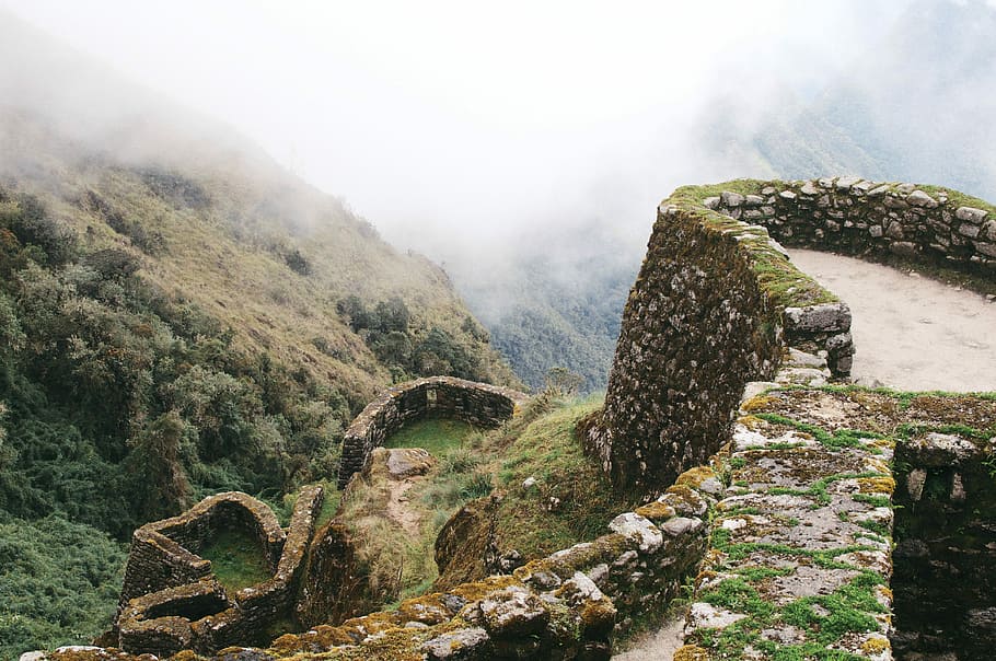 green grass mountain with fog, stone fence during daytime, cloud HD wallpaper