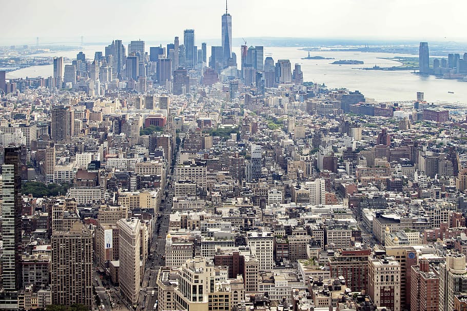 aerial photography of high-rise buildings near body of water at daytime, aerial view photography of high rise buildings at daytime HD wallpaper