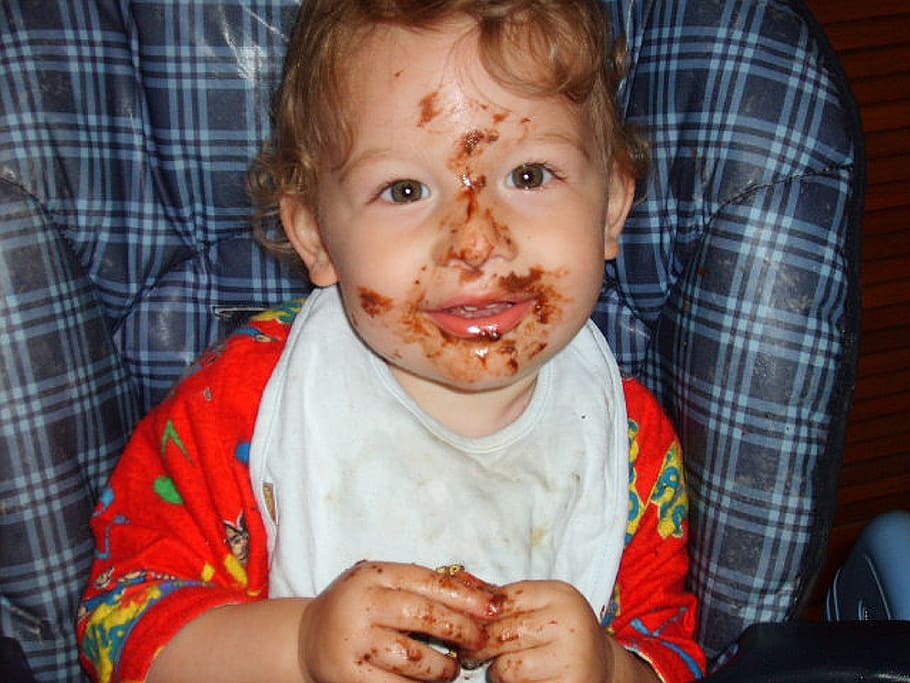 baby sitting on blue and black plaid chair, boy, dirty, eating HD wallpaper
