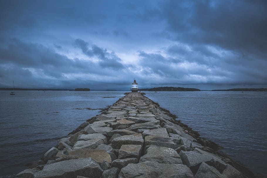 photo of gray rock formation pathway at noontime, lighthouse HD wallpaper