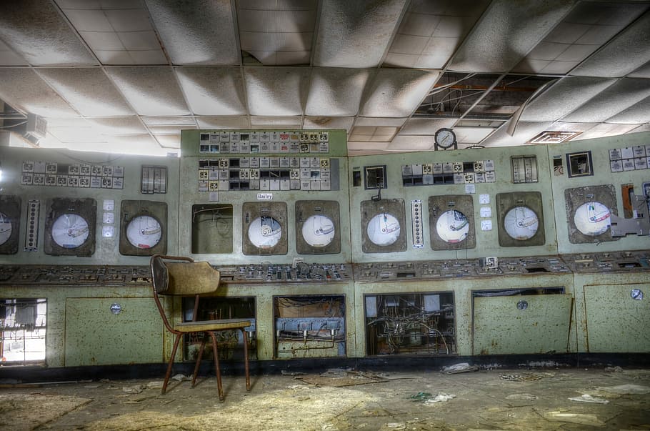 white analog clocks near parson chair, indoors, abandoned, old