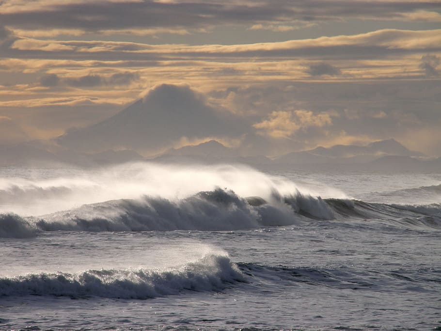 ocean waves and cirrus clouds at golden hour, volcano, storm HD wallpaper