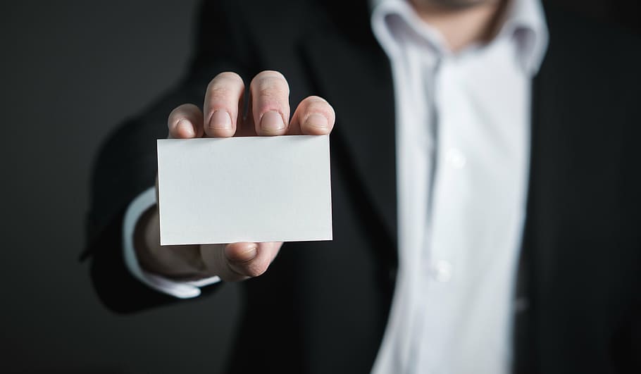 person holding white labeled box, business card, man, hand, suit, HD wallpaper