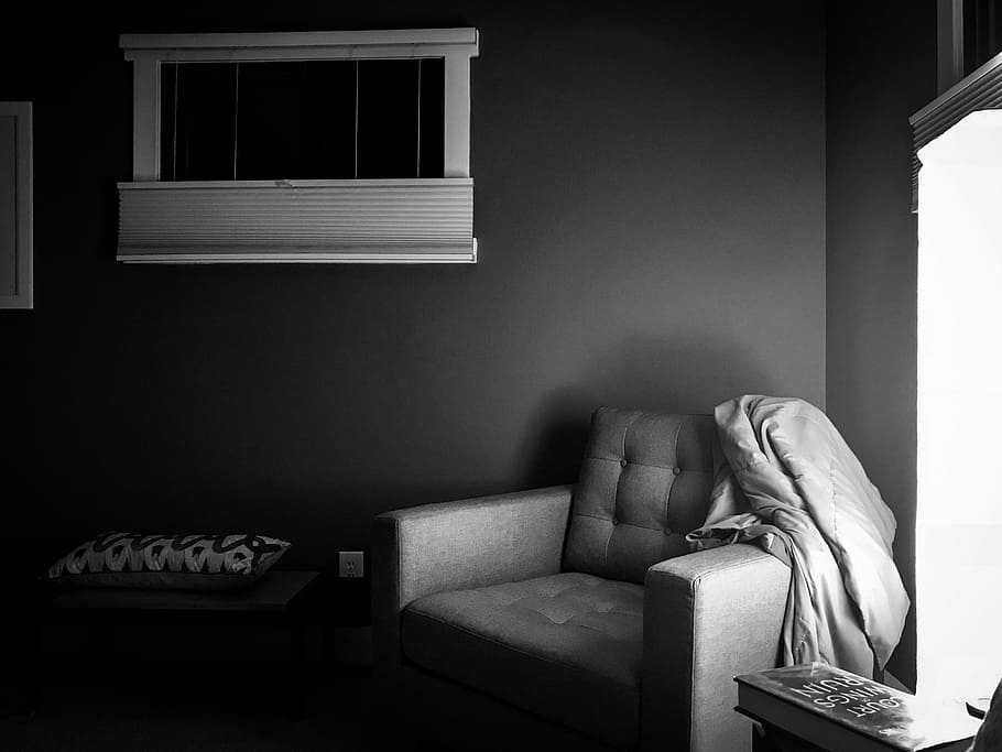 grayscale photography of sofa chair on corner, grayscale photography of armchair inside room