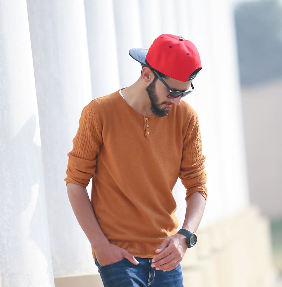 HD wallpaper: man wearing orange long-sleeved shirt and red cap, stylish boy  | Wallpaper Flare