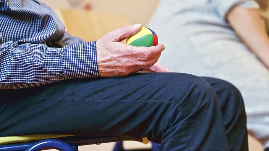shallow focus photography of elderly man holding a ball, people HD wallpaper