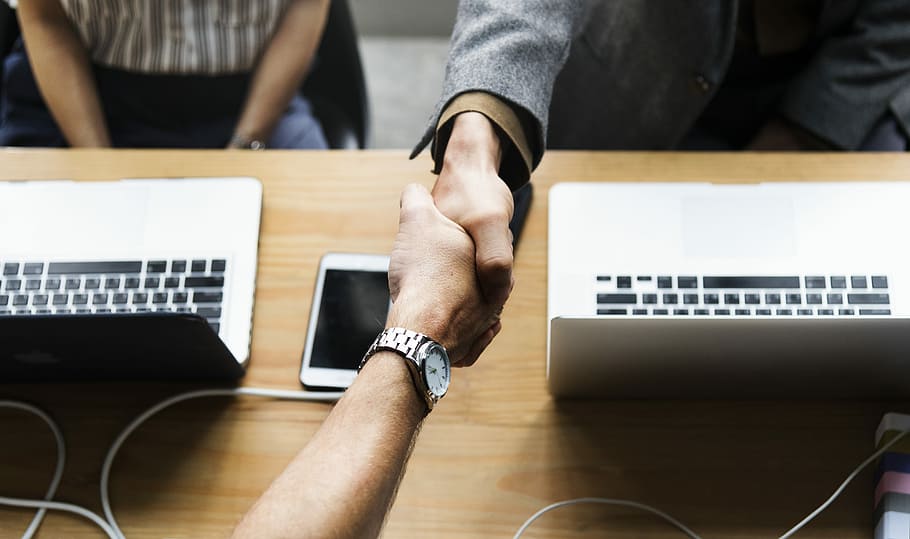 two person shaking hands, handshake, meeting, laptop, computer