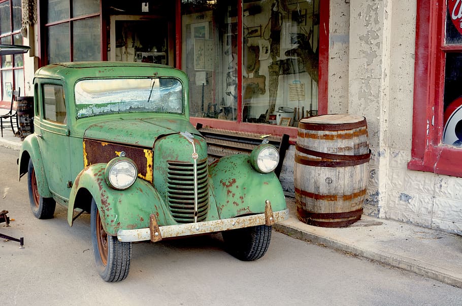 classic green vehicle parked beside building at daytime, Auto HD wallpaper