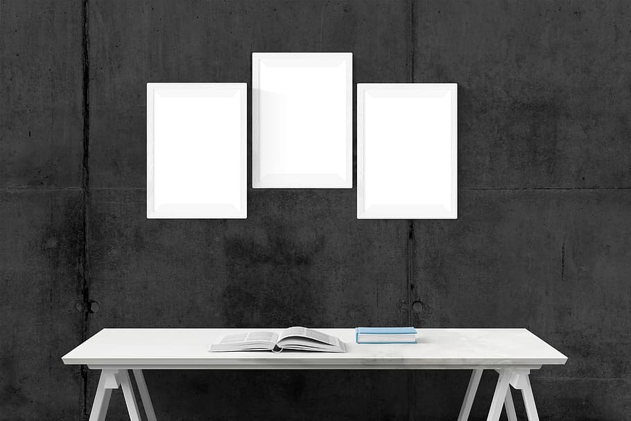 three rectangular white photo frames and white wooden table, poster, HD wallpaper