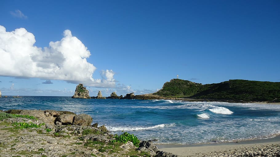 rock formation near body of water, caribbean, sea, sand, island