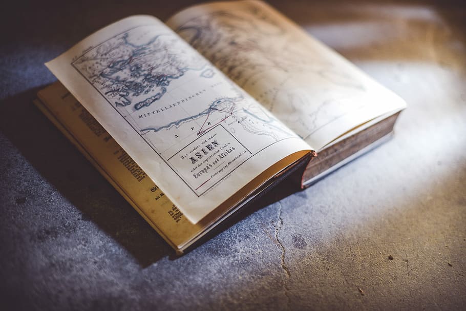 opened book on gray concrete surface, map, paper, print, reading HD wallpaper