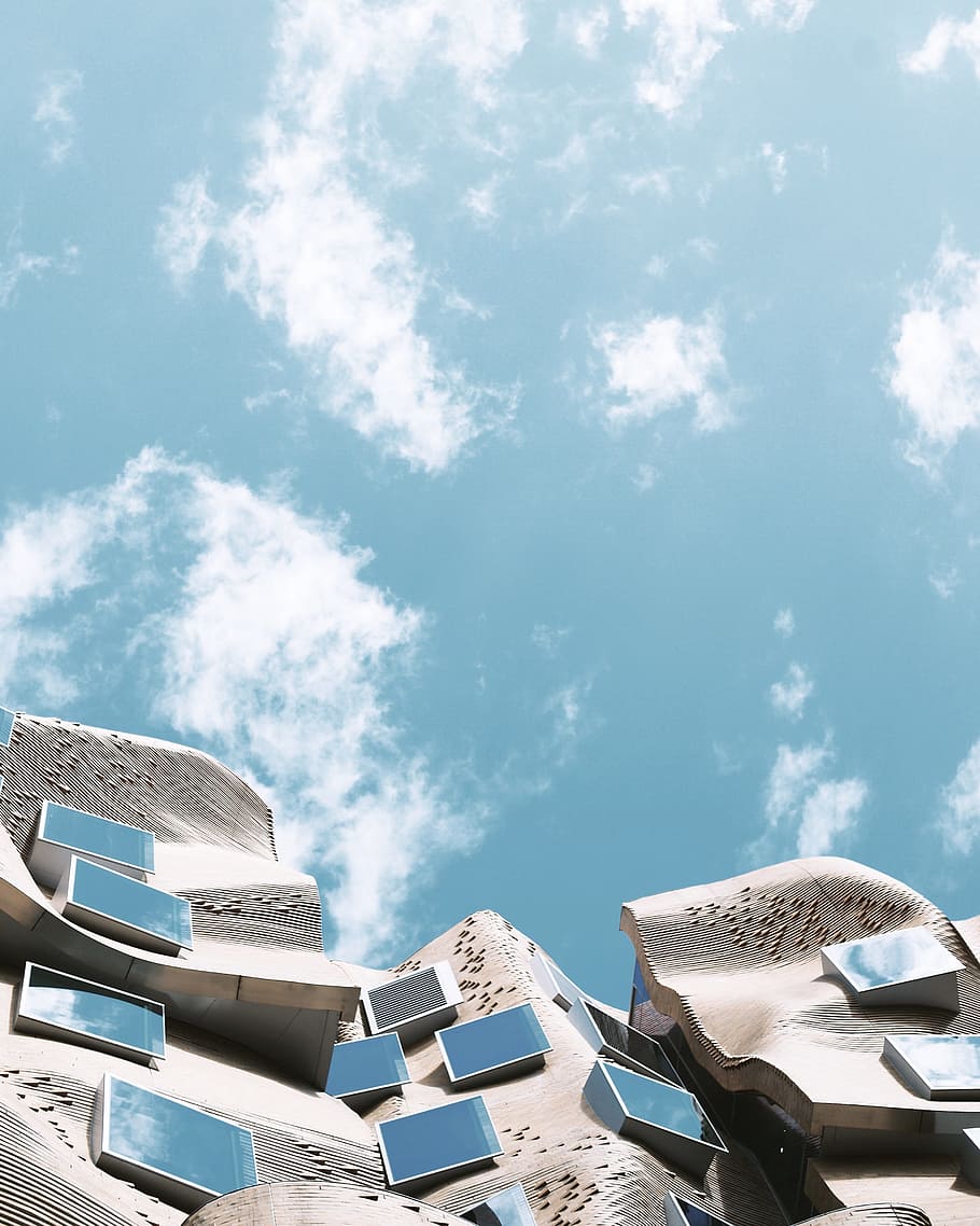 bottom-view of building during daytime, worm's eye view photography of cloudy blue sky during daytime HD wallpaper