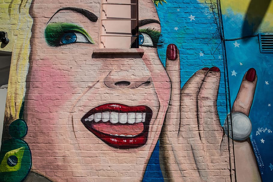Street art depicting a woman smiling captured on a wall in Camden, Central London. Image taken with a Canon 6D, HD wallpaper